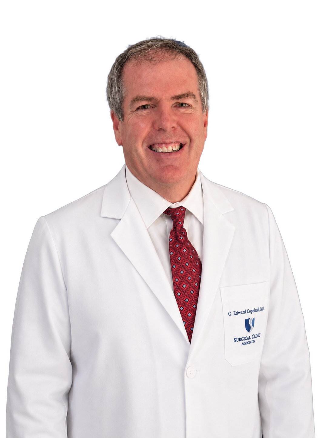 Portrait of Edward Copeland, MD, FACS, in a white coat